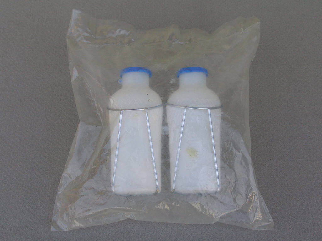 <------------------- SOLD -----------------> handlebar mount dual water bottle cage with bottles - 1960's (NOS / NIP)
