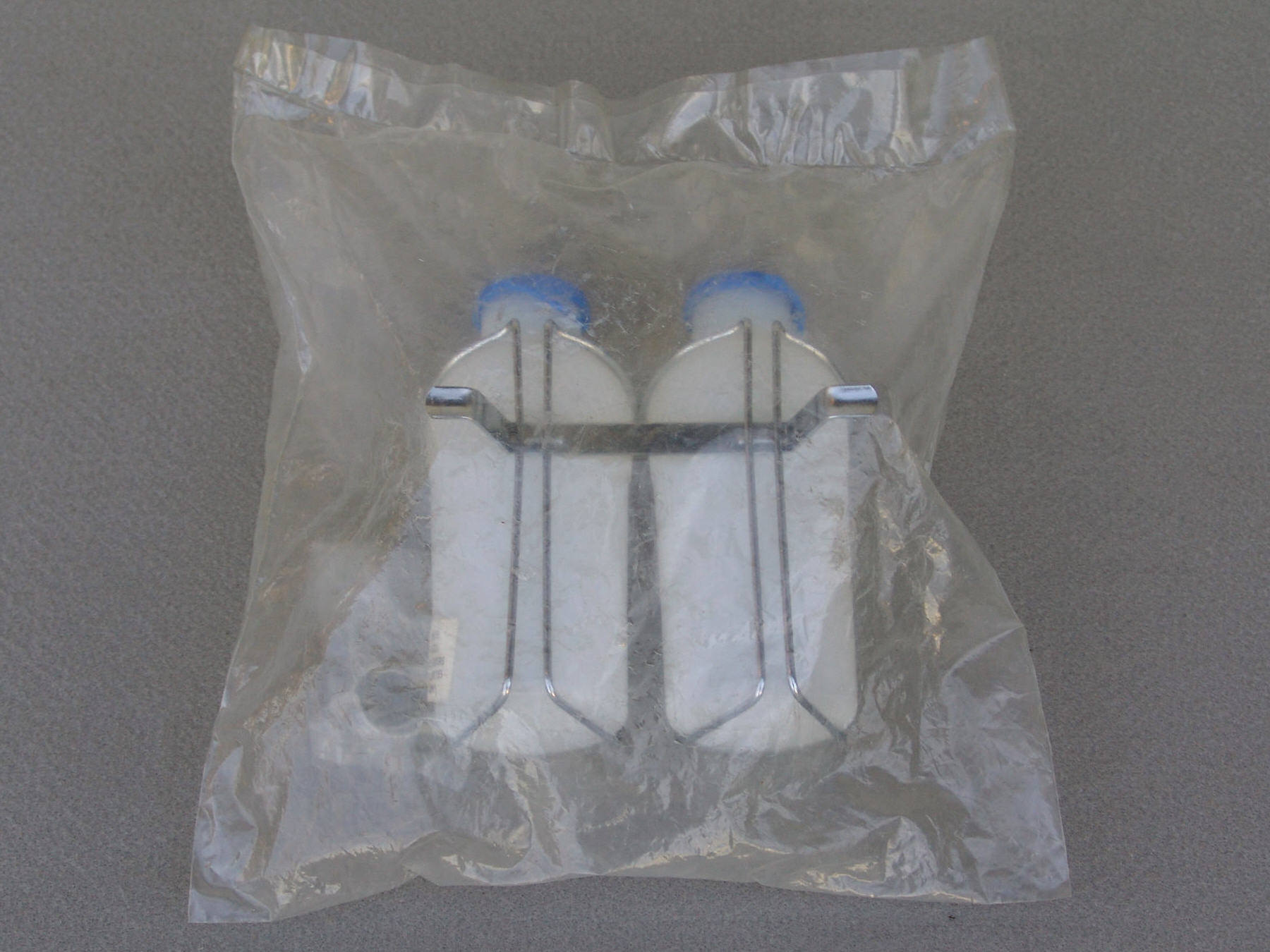 <------------------- SOLD -----------------> handlebar mount dual water bottle cage with bottles - 1960's (NOS / NIP)