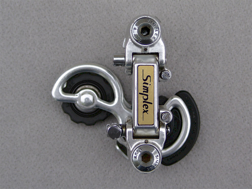 <------------------ SOLD ------------------> Simplex SLJ 5000 T/SP rear derailleur (USED)