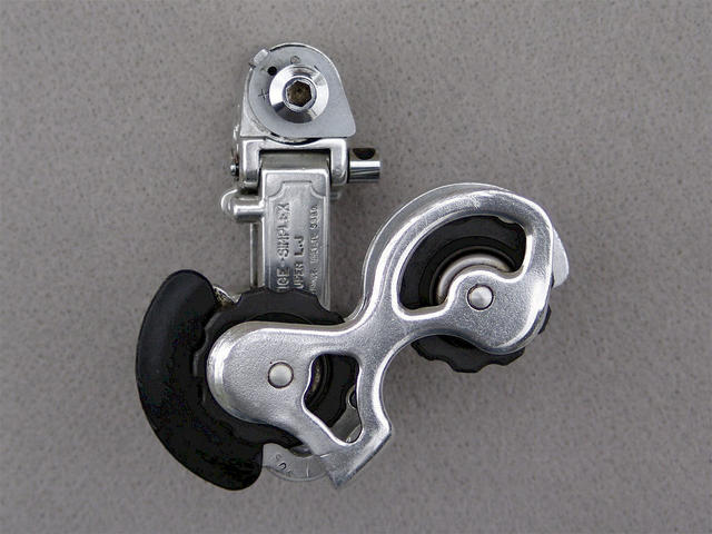 <------------------ SOLD ------------------> Simplex SLJ 5000 T/SP rear derailleur (USED)
