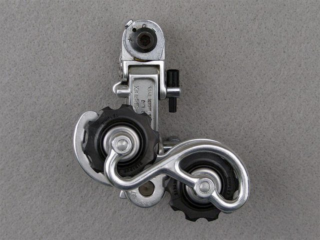 <------------------ SOLD ------------------> Simplex SLJ 5500 CP/SP rear derailleur (NOS)