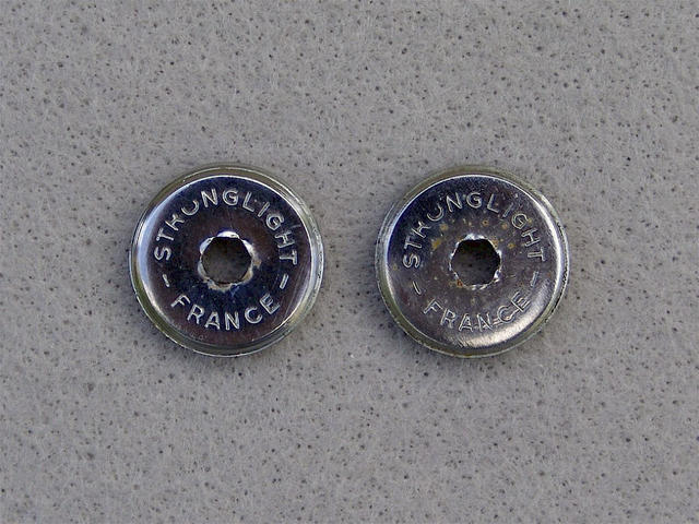 <------------------ SOLD ------------------> Stronglight crank arm dust caps (USED)