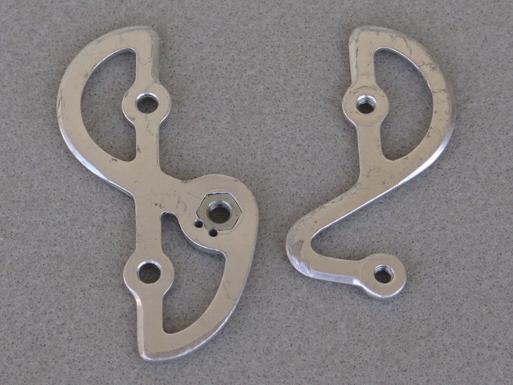 <------------------ SOLD ------------------> Campagnolo derailleur pulley cage plates (USED)