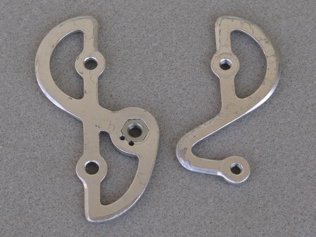 <------------------ SOLD ------------------> Campagnolo derailleur pulley cage plates (USED)