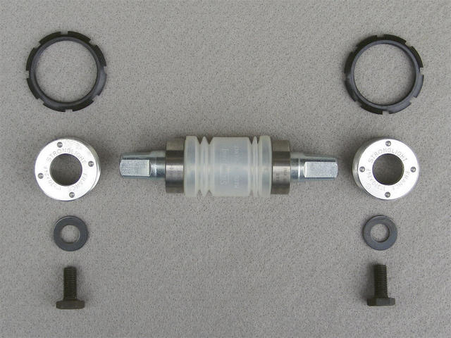<------------------ SOLD ------------------> Stronglight 651 bottom bracket - steel spindle - 118 mm - English (NOS)