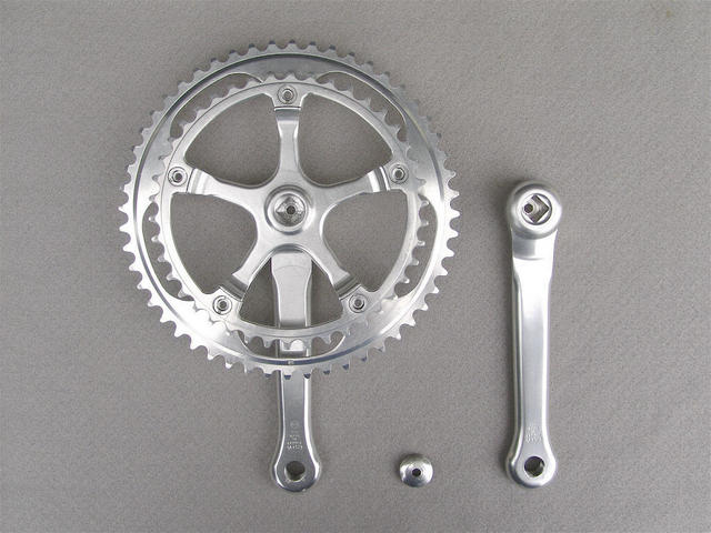 <------------------ SOLD ------------------> Stronglight 107 crankset - 42/52 double - 144 mm BCD (NOS / USED)