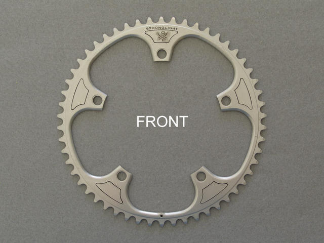 <------------------ SOLD ------------------> Stronglight model 107 chain ring - 54 tooth - 144 mm BCD (NOS)